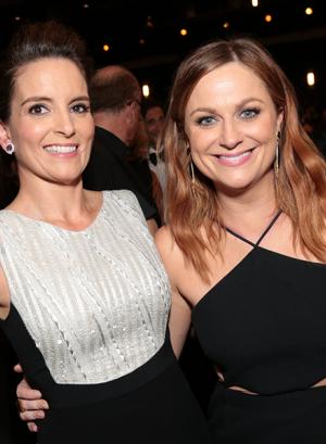 Tina Fey and Amy Poehler at the 67th Emmy Awards.
