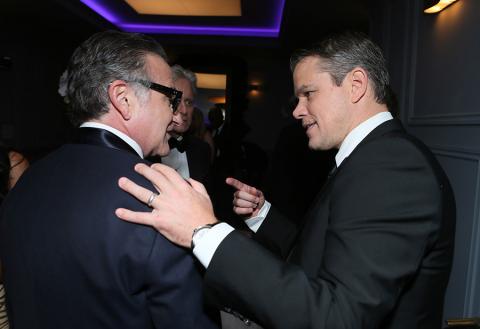 Robin Williams and Matt Damon share a moment in the Audi Green Room at the 65th Emmy Awards.