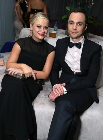 Amy Poehler and Jim Parsons relax in the Audi Green Room at the 65th Emmy Awards.