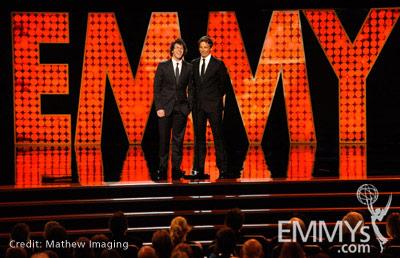 Andy Samberg (L) and Seth Meyers speak onstage during the 62nd Primetime Creative Arts Emmy Awards 