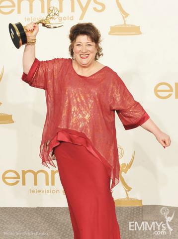 Margo Martindale poses with the award for "Outstanding Supporting Actress in a Drama Series" in the press room