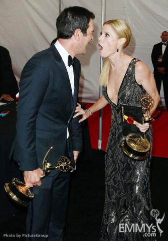 Modern Family stars Ty Burrell and Julie Bowen with their Emmys at the 63rd Primetime Emmy Awards at Nokia Theatre