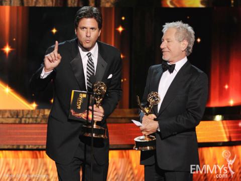 Steven Levitan and Jeffrey Richman accept the award for Outstanding Writing for a Comedy Series 