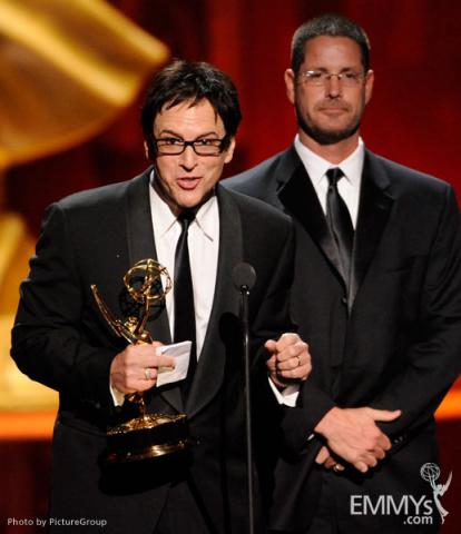 Robert J. Ulrich and Eric Dawson accepting their award at the 2011 Primetime Creative Arts Emmys