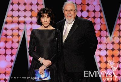 Lily Tomlin (L) and George Schlatter speak onstage during the 62nd Primetime Creative Arts Emmy Awards