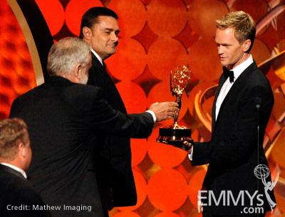 Winners of Best Art Direction for Movie/Mini for "The Pacific" with Neil Patrick Harris onstage