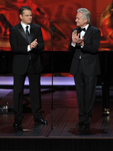 Matt Damon and Michael Douglas on stage at the 65th Emmys