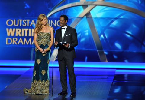 Connie Britton and Blair Underwood on stage at the 65th Emmys