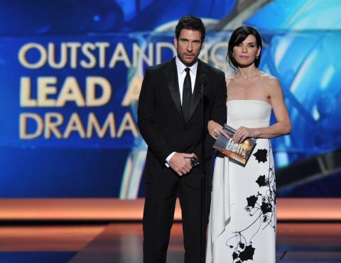 Dylan McDermott and Julianna Margulies on stage at the 65th Emmys