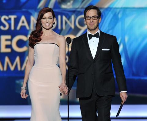 Carrie Preston and Dan Bucatinsky on stage at the 65th Emmys