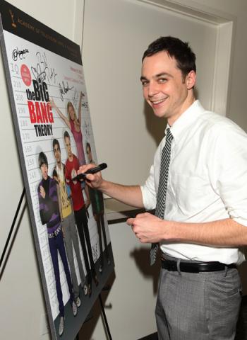 Jim Parsons autographs the evening's poster at "An Evening with The Big Bang Theory"