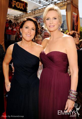 Lara Embry (L) and Jane Lynch arrive at the Academy of Television Arts & Sciences 63rd Primetime Emmy Awards 