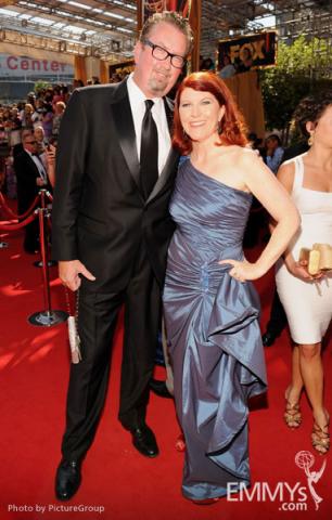 Kate Flannery (R) and Chris Haston (L) arrive at the Academy of Television Arts & Sciences 63rd Primetime Emmy Awards
