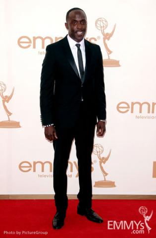 Michael Kenneth Williams arrives at the Academy of Television Arts & Sciences 63rd Primetime Emmy Awards