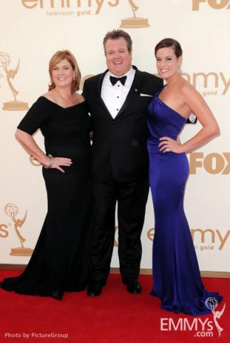 Eric Stonestreet (C) and guests arrive at the Academy of Television Arts & Sciences 63rd Primetime Emmy Awards