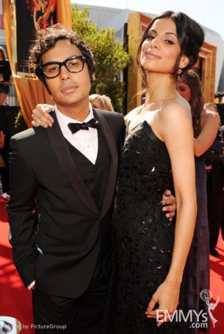 Kunal Nayyar (L) and guest arrive at the Academy of Television Arts & Sciences 63rd Primetime Emmy Awards