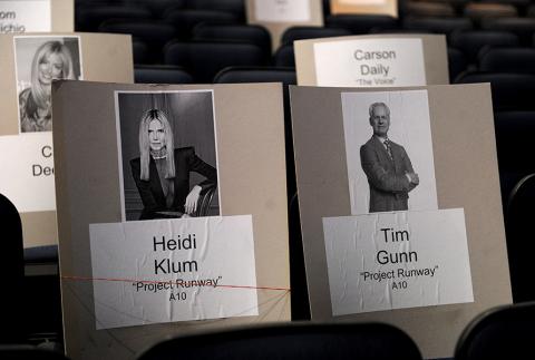 Of course they'd sit together for the 65th Emmy Awards.