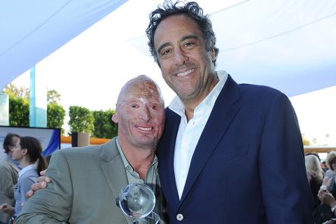 Bobby Henline (Comedy Warriors: Healing Through Humor) and Brad Garrett at the Seventh Annual Television Academy Honors in Beverly Hills, California. 