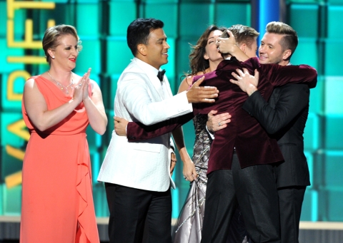 Mandy Moore, Napoleon Dumo, Tabitha Dumo, Travis Wall, and Derek Hough on stage at the 65th Emmys 