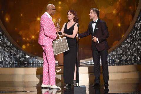 RuPaul Charles accepts an award at the 2016 Creative Arts Emmys.