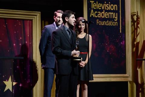 Aleksandr Rikhterman accepts an award at the 36th College Television Awards at the Skirball Cultural Center in Los Angeles, California, April 23, 2015.