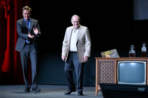 Conan O'Brien ushers Bob Newhart onstage at The Rise of the Cerebral Comedy: A Conversation with Bob Newhart, presented Tuesday, Aug. 8, 2017, at the Television Academy's Wolf Theater at the Saban Media Center in North Hollywood, California. 