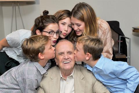 Bob Newhart gets a birthday kiss from his grandchildren at The Rise of the Cerebral Comedy: A Conversation with Bob Newhart, presented Tuesday, Aug. 8, 2017, at the Television Academy's Wolf Theater at the Saban Media Center in North Hollywood, California