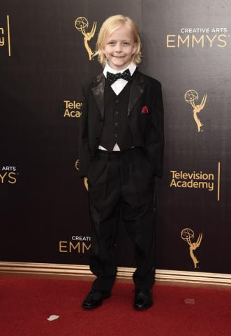 Christian Ganiere on the red carpet at the 2016 Creative Arts Emmys.