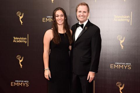 President and Chief Operating Officer, Maury McIntyre and guest arrive on the red carpet at the 2016 Creative Arts Emmys. 