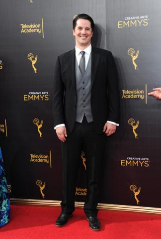 Chris Bacon on the red carpet at the 2016 Creative Arts Emmys.