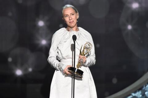 Michele Clapton accepts an award at the 2016 Creative Arts Emmys. 