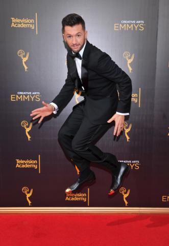 Travis Wall on the red carpet at the 2016 Creative Arts Emmys.