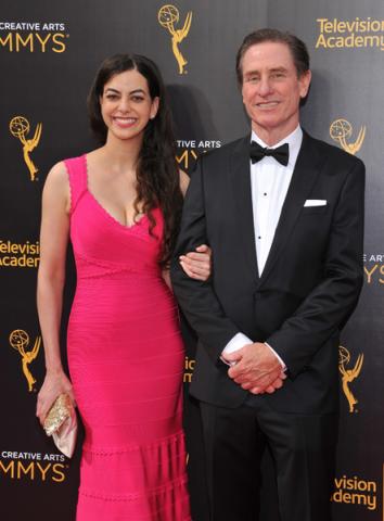 Claudia Kernan and Gary R. Benz on the red carpet at the 2016 Creative Arts Emmys.
