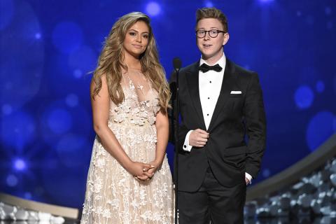 Bethany Mota and Tyler Oakley on stage at the 2016 Creative Arts Emmys.