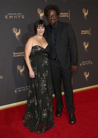 W. Kamau Bell and Melissa Bell on the red carpet at the 2017 Creative Arts Emmys.