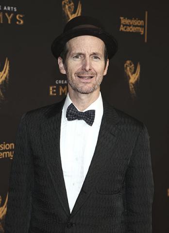 Denis O'Hare on the red carpet at the 2017 Creative Arts Emmys. 