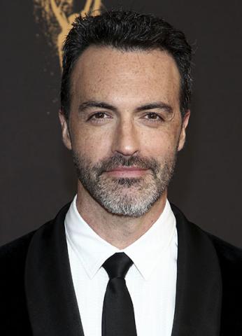 Reid Scott on the red carpet at the 2017 Creative Arts Emmys. 