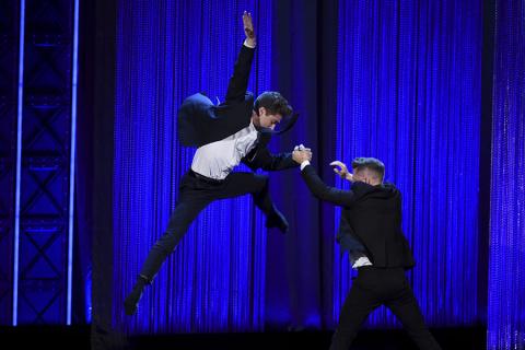 Travis Wall on stage at the 2017 Creative Arts Emmys. 