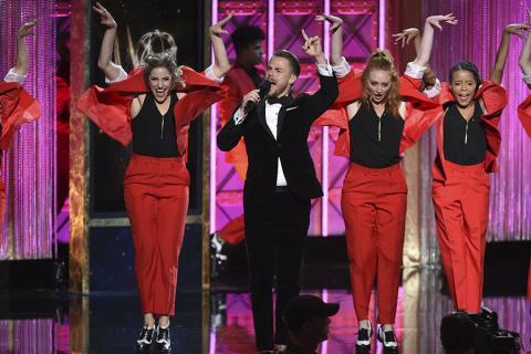 Derek Hough on stage at the 2017 Creative Arts Emmys.