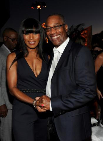 Angela Bassett (l) of American Horror Story: Coven and Joe Morton (r) of Scandal attend the Performers nominee reception.