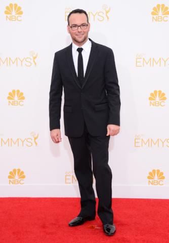 Dana Brunetti arrives at the 66th Emmy Awards.