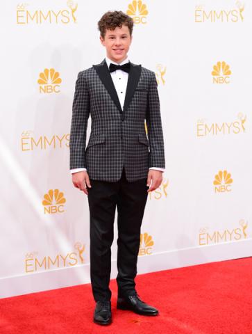 Nolan Gould of Modern Family arrives at the 66th Emmys.