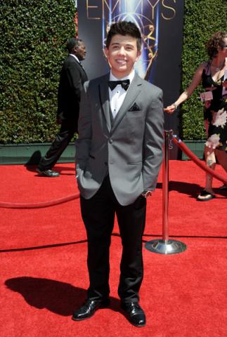Bradley Steven Perry arrives for the 2014 Primetime Creative Arts Emmys.