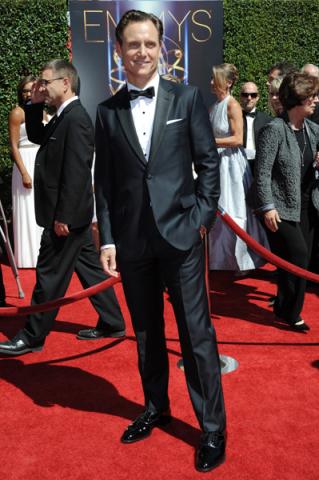 Tony Goldwyn arrives for the 2014 Primetime Creative Arts Emmys.