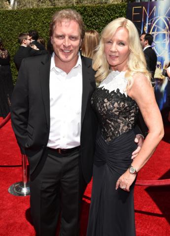 Sig Hansen and June Hansen arrive for the 2014 Primetime Creative Arts Emmys.