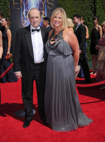 Bob Newhart and Courtney Newhart arrive for the 2014 Primetime Creative Arts Emmys.