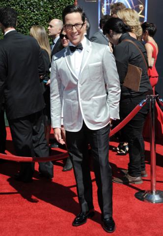 Dan Bucatinsky arrives for the 2014 Primetime Creative Arts Emmys.