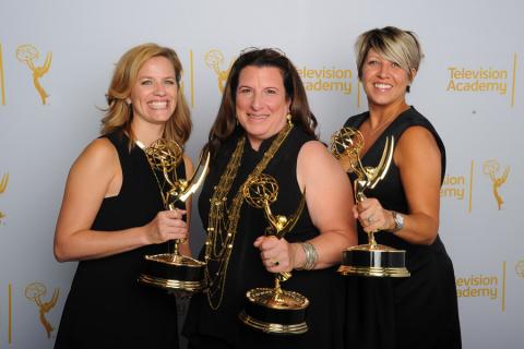 Alexa L. Fogel (left), Christine Kromer and Meagan Lewis celebrate their win at the 2014 Primetime Creative Arts Emmys.
