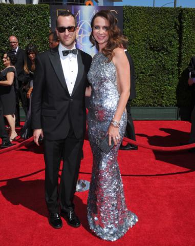Peter Yozell, and Janie Bryant arrive for the 2014 Primetime Creative Arts Emmys.