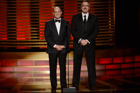 Matt Weiner and Vince Gilligan present an award at the 2014 Primetime Creative Arts Emmys.